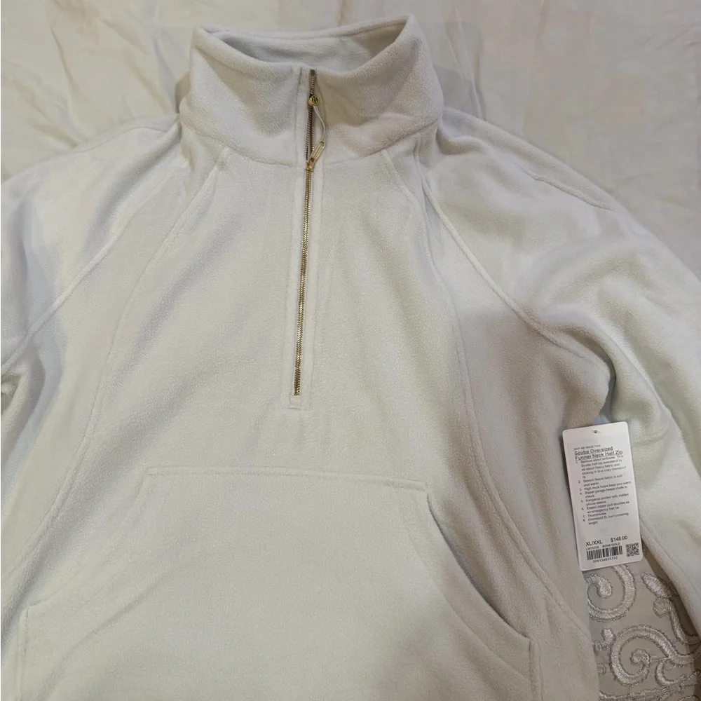 Scuba Tumbled Fleece Funnel-
Neck Half Zip
Colour Bone/Gold
Size XL/XXL - Picture 2 of 10